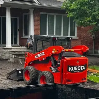 Kubota SSV65 · 64 hp · vertical lift · enclosed cab